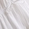 Minikleid aus Baumwolle mit Stufenschnitt und V-Ausschnitt