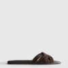 Mules mit geflochtenen Riemen