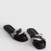 Mules mit geflochtenen Riemen