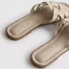 Mules mit geflochtenen Riemen