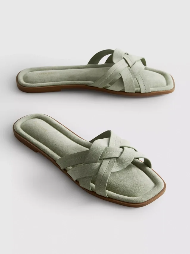 Mules mit geflochtenen Riemen