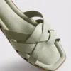 Mules mit geflochtenen Riemen