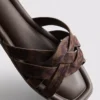 Mules mit geflochtenen Riemen