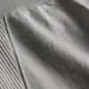 Nahtlose, hochglänzende Aktiv-Leggings