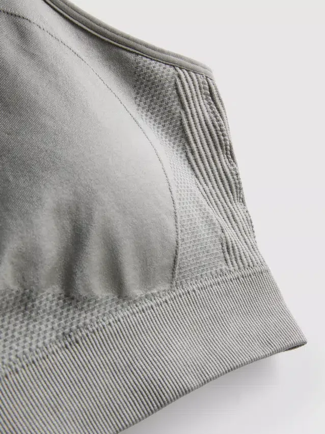 Nahtloses, hochglänzendes Active-Crop-Top