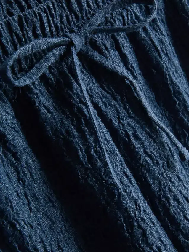 Paula Echevarría – Crinkle-Hose mit weitem Bein