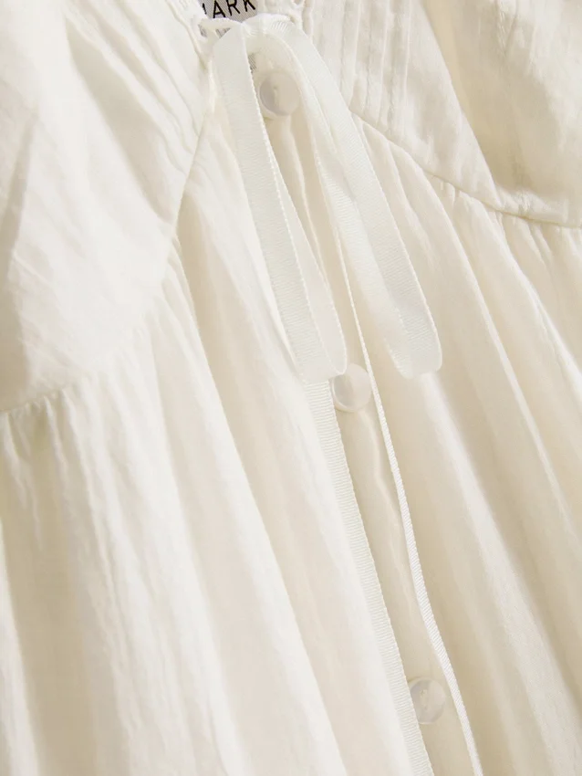 Paula Echevarría Minikleid mit Spitzenbesatz und Rüschen