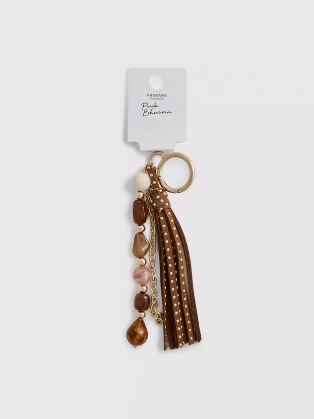 Paula Echevarría Perlen-Taschenanhänger mit Quaste