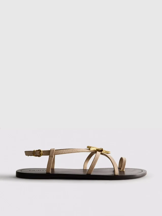 Paula Echevarría Riemchensandalen mit Seestern-Motiv