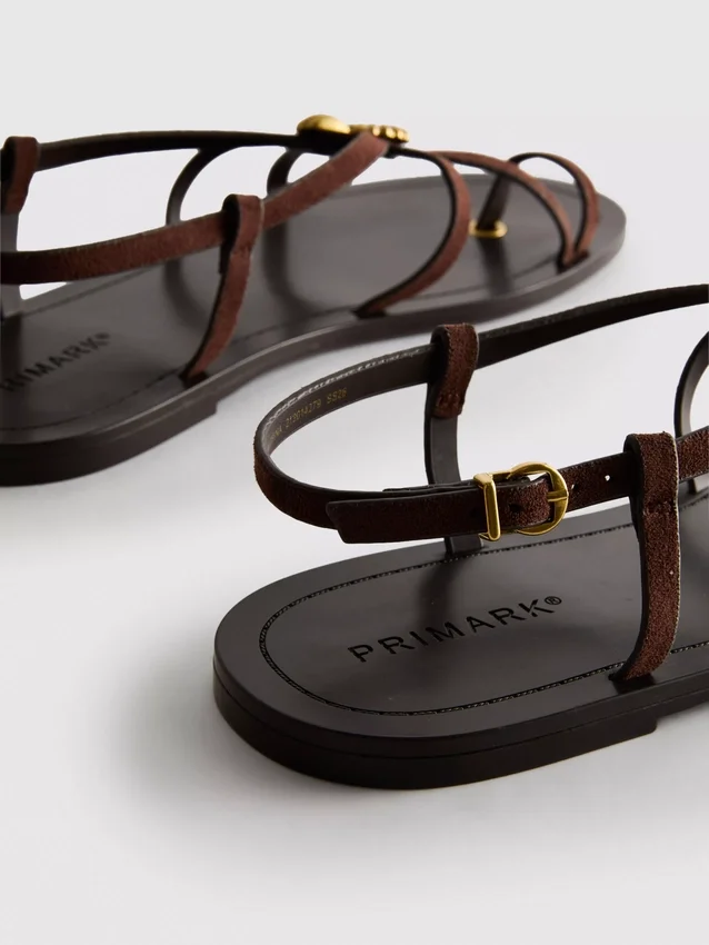 Paula Echevarría Riemchensandalen mit Seestern-Motiv