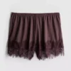 Paula Echevarría Shorts mit Spitzenbesatz