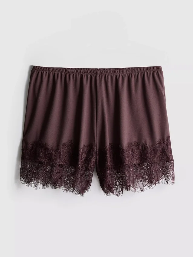 Paula Echevarría Shorts mit Spitzenbesatz