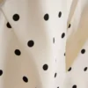 Peplum-Top mit Neckholder und Polka-Dots