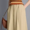 Plissierte Hosen mit weitem Bein in Papieroptik