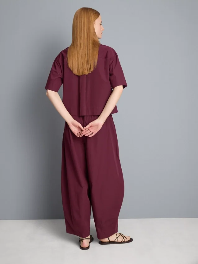 Plissierte Hosen mit weitem Bein in Papieroptik