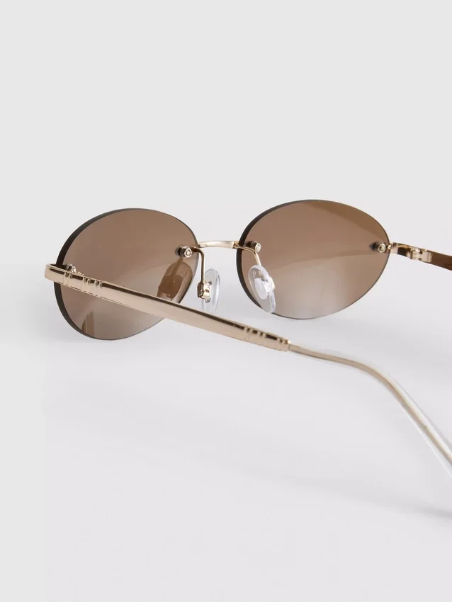 Randlose Sonnenbrille mit ovalen Gläsern