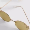 Runde Sonnenbrille mit Blumenmotiv