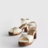 Sandalen mit Nieten und High Heels aus Kunstwildleder