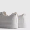 Sneaker mit gestickten Gänseblümli