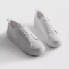 Sneaker mit gestickten Gänseblümli