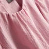 Strukturierte Bluse mit Ballonärmeln