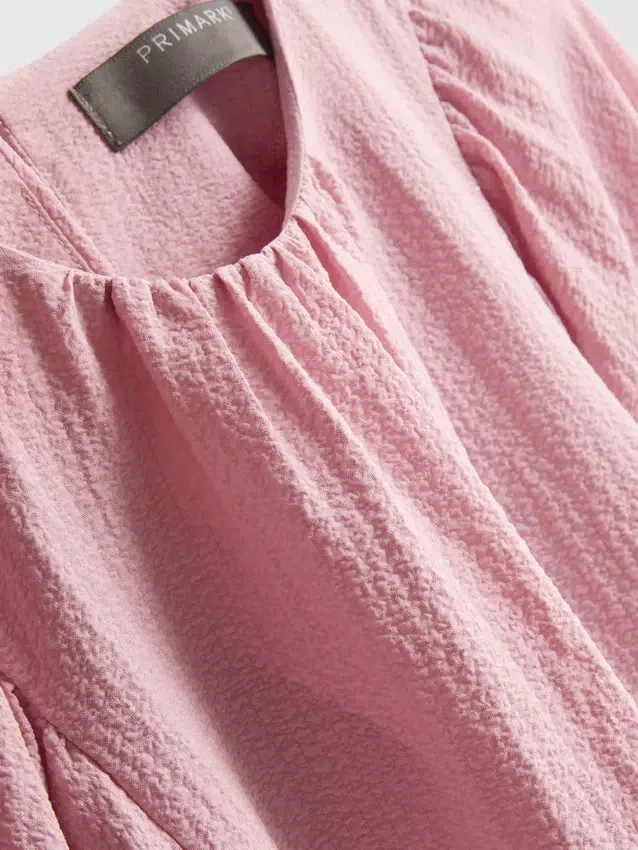 Strukturierte Bluse mit Ballonärmeln