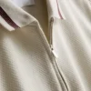 Strukturiertes Polohemd mit Reissverschluss am Hals