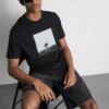 T-Shirt mit Surfer-Foto-Motiv