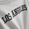 The Primark Scene | Sweatshirt mit Slogan und schulterfreiem Ausschnitt
