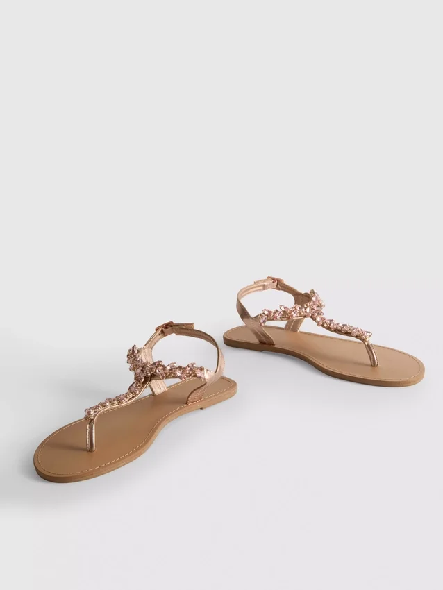 Verzierte Zehensandalen